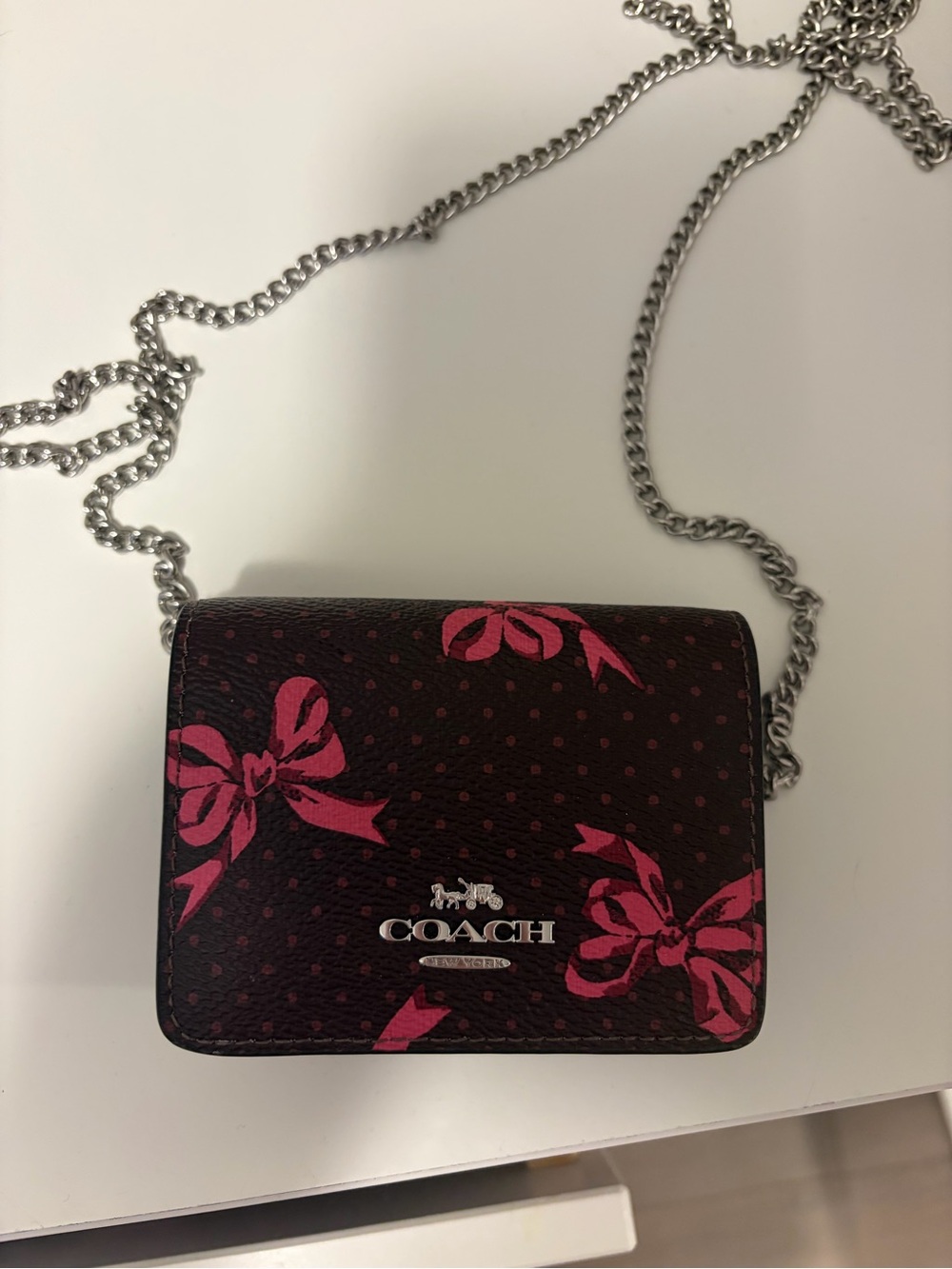 COACH Pink Bow Print Mini Crossbody Bag